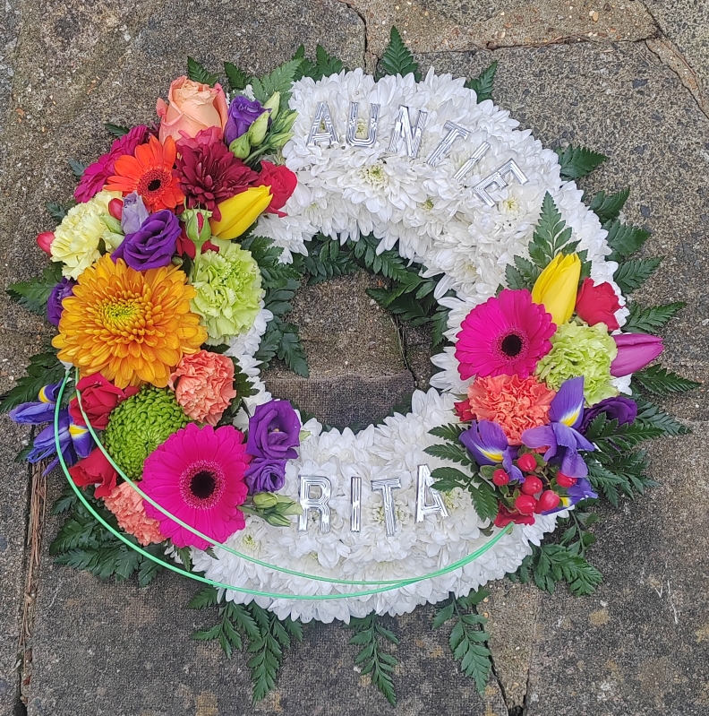 wreath, circle, bright, funky, white, oasis, based, funeral, tribute, flowers, harold wood, romford, florist, delivery, havering 