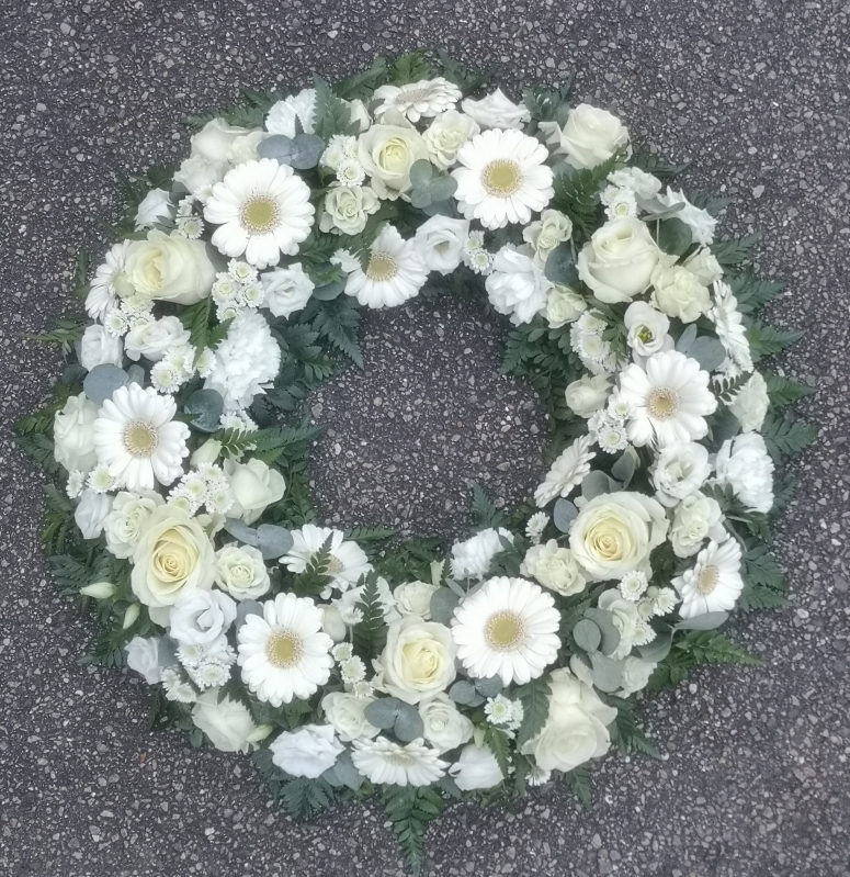white wreath funeral flowers tribute