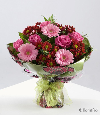 Red and pink bouquet with gerberas, chrysanthemums and roses