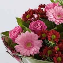 Red and pink bouquet with gerberas, chrysanthemums and roses