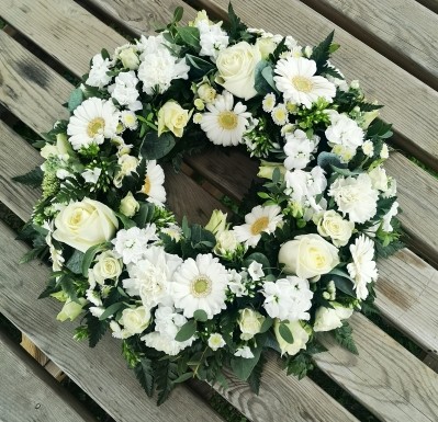 white wreath funeral flowers tribute