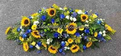 casket, coffin, spray, sunflowers, helianthus, blue, roses, male, female, funeral, tribute, flowers, oasis, harold wood, romford, havering, delivery