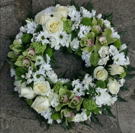 wreath, circle, orchid, white, oasis, funeral, tribute,oasis, man, woman, male, female, flowers, harold wood, romford, havering, florist, delivery