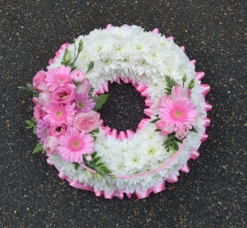 based, pink, white, funeral, circle, wreath,  tribute,  flower , design,  roses, gerberas harold wood romford florist havering,brenwood, dagenham delivery