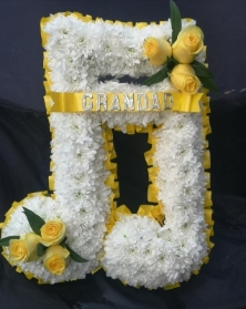 musical note funeral flowers tribute music