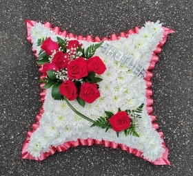 Red rose, cushion, pillow, wreath, funeral flowers, tribute, florist, Harold wood, Romford, Havering, Delivery, undertakers, funeral directors 